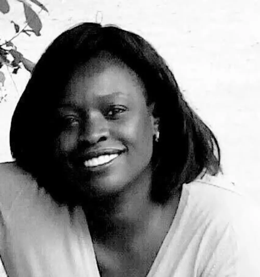 A black and white photo of Adelphine Williams who is an accredited psychotherapeutic counsellor